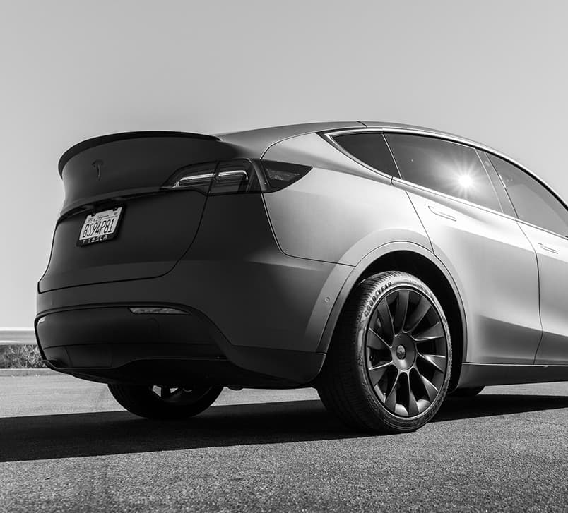 Rear view of Tesla Model Y, showcasing its sporty body